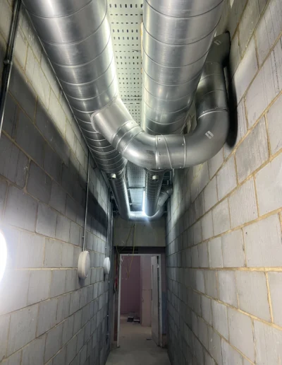air_conditioning_installation_in_long_hallway_fresh_air_facilities